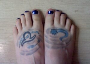 Foot tattoos Ruth Carter