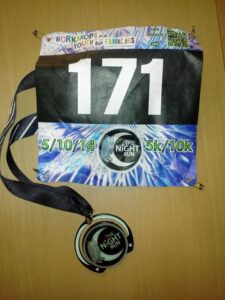 My Medal from The Night Run - It Glows in the Dark